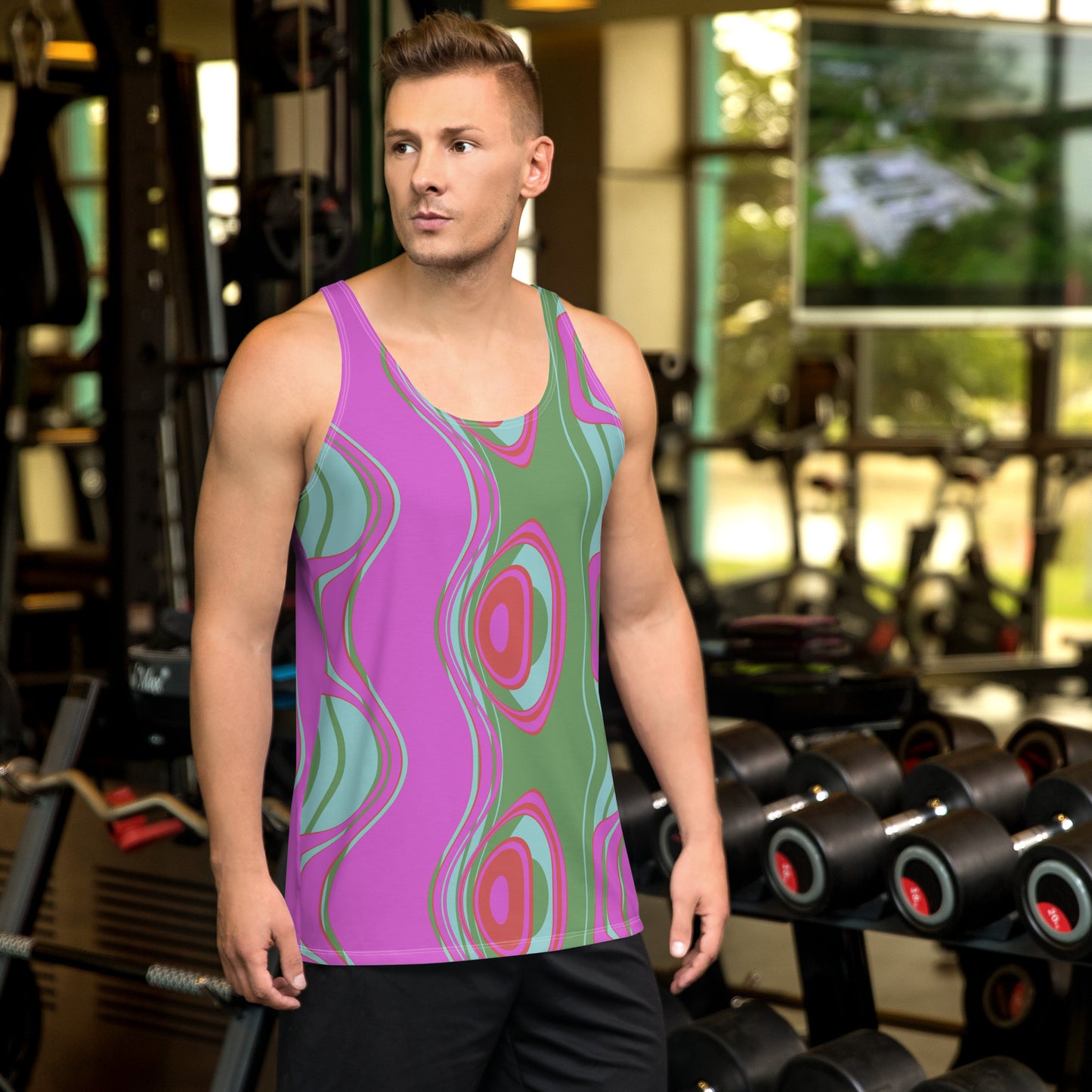 Far out man! This tank top has everything you could possibly need – vibrant colors, soft material, and a relaxed fit that will make you look fabulous! Pattern on tank top: The Far Out Wave: "The Far Out Wave" is a retro inspired pattern. Reminiscent of a lava lamp with its floating globules. This is a pattern someone could stare into for ever and never lose interest.