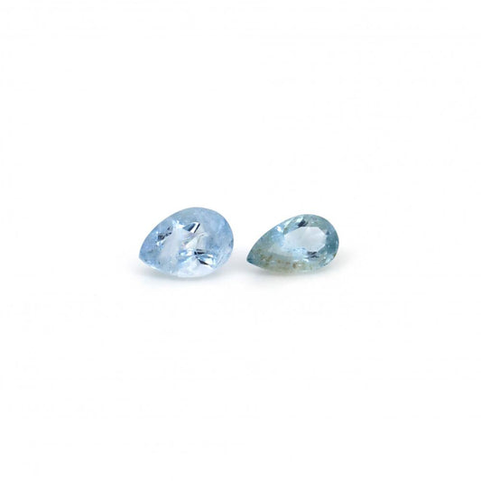 Two Certified Light Blue Pear Cut Aquamarines (Beryl) 3.25CT Visible Eye Inclusions. For sale from Lost Woods Arts in Valemount British Columbia Canada