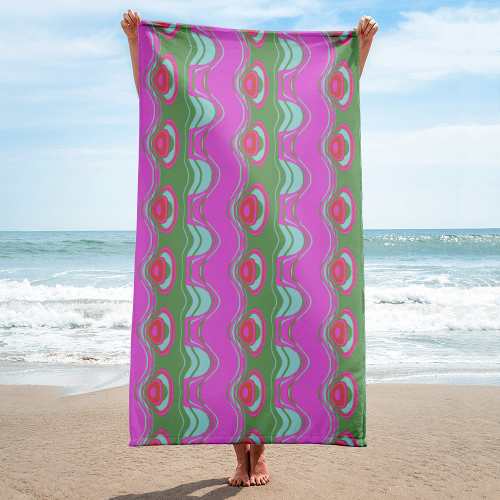 Far out man!  Give your bathroom a vibrant look and wrap yourself up with this super soft and cozy all-over artwork printed towel.  Pattern on towel: The Far Out Wave:  "The Far Out Wave" is a retro inspired pattern. Reminiscent of a lava lamp with its floating globules. This is a pattern someone could stare into for ever and never lose interest.