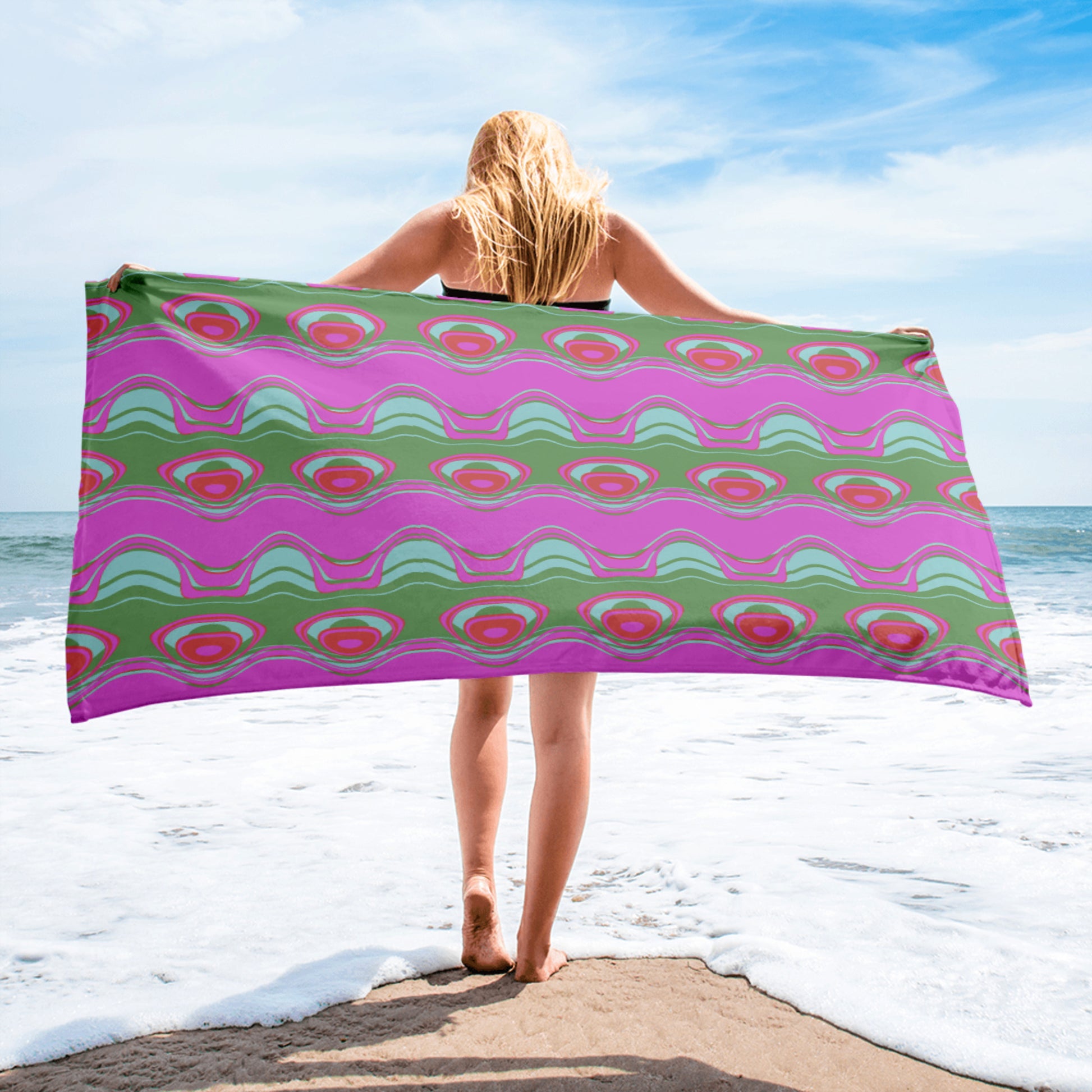 Far out man!  Give your bathroom a vibrant look and wrap yourself up with this super soft and cozy all-over artwork printed towel.  Pattern on towel: The Far Out Wave:  "The Far Out Wave" is a retro inspired pattern. Reminiscent of a lava lamp with its floating globules. This is a pattern someone could stare into for ever and never lose interest.