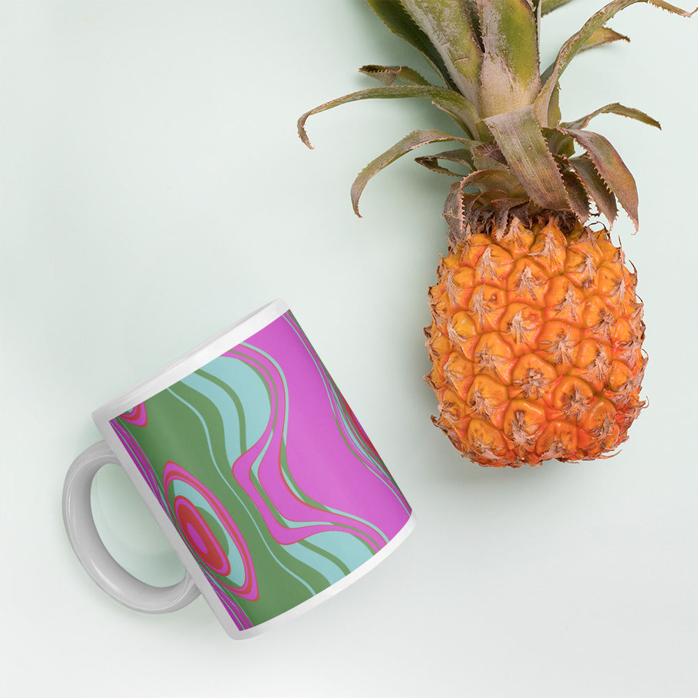 ﻿Far out man!  Whether you're drinking your morning coffee, evening tea, or something in between—this retro inspired mug's for you! It's sturdy and glossy with a vivid print that'll withstand the microwave and dishwasher.  Pattern on mug: The Far Out Wave  "The Far Out Wave" is a retro inspired pattern. Reminiscent of a lava lamp with its floating globules. This is a pattern someone could stare into for ever and never lose interest.